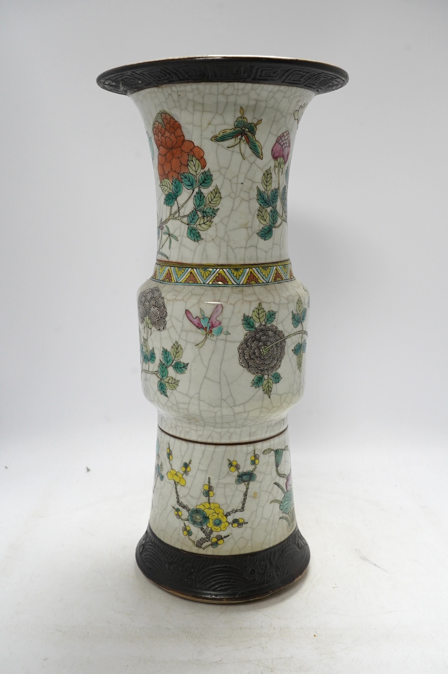 A large Chinese famille rose crackle gu vase, early 20th century, 44.5cm high. Condition - has hole to base where possibly used as a lamp, rest of lamp good